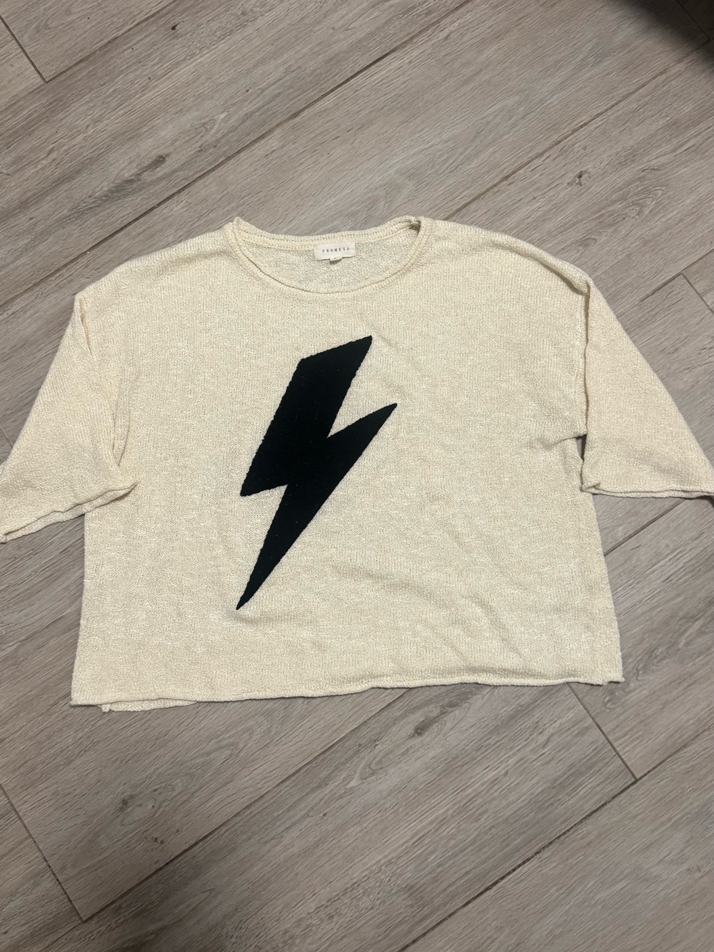 Promesa Cream Sweater with Black Lightning Bolt